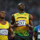 Illustration for article titled Photos Of Usain Bolt Looking Bored As He Blows Past The Best Runners In The World
